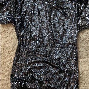 Cold shoulder sequence dress.